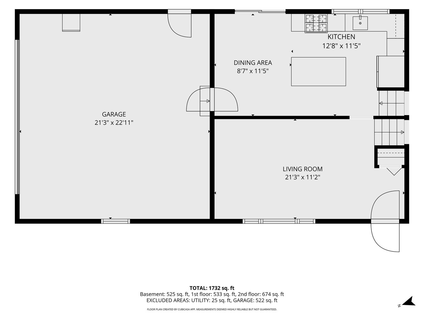 Floor plan, entry level: living room, dining area, kitchen and garage