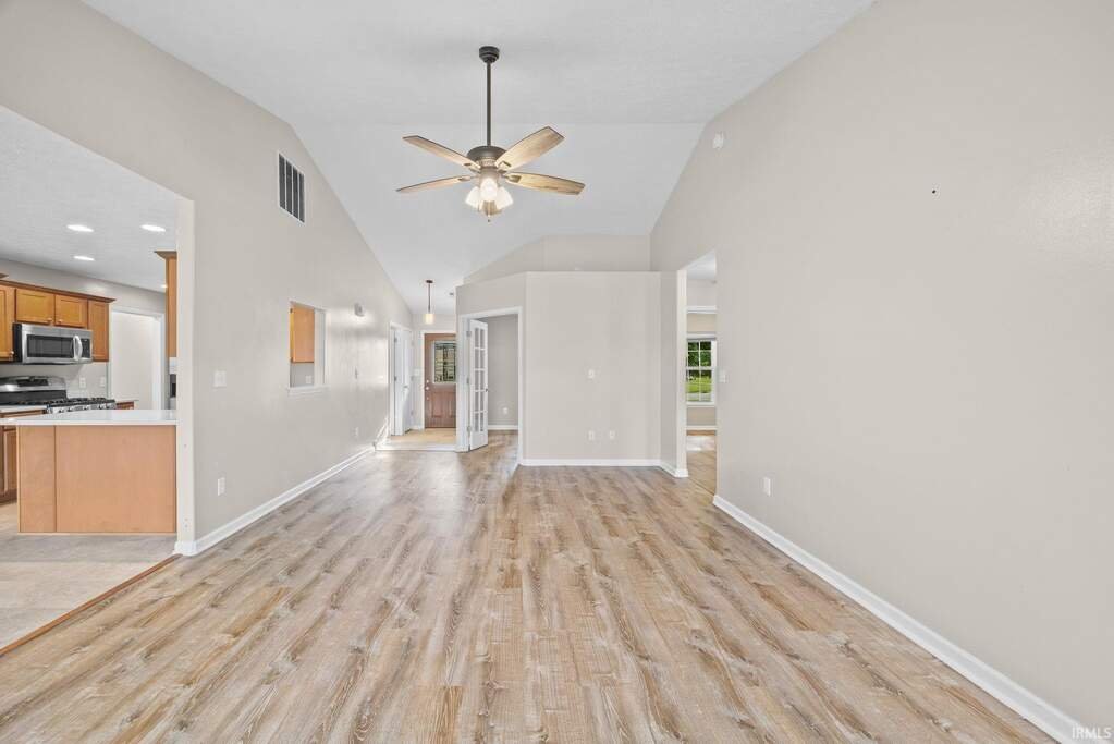 Great room looking toward the kitchen and hall